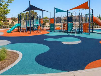 Community playground in coloured rubber surfacing