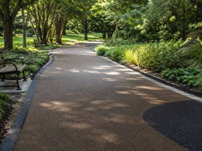 Wooded park path in rubber surfacing